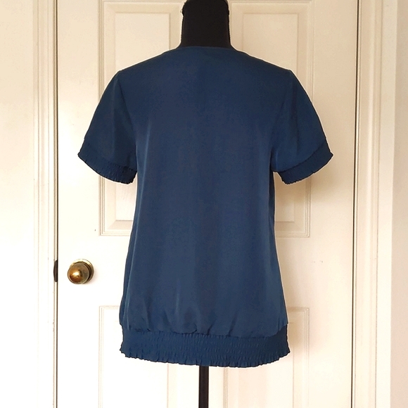 NWT. The Limited Short Sleeve Blouse w/front design and elastic designed edges. - Picture 2 of 4